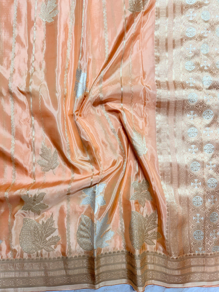 KOREAN SILK IN PEACH ORANGE WITH GOLD AND SILVER ZARI WORK
