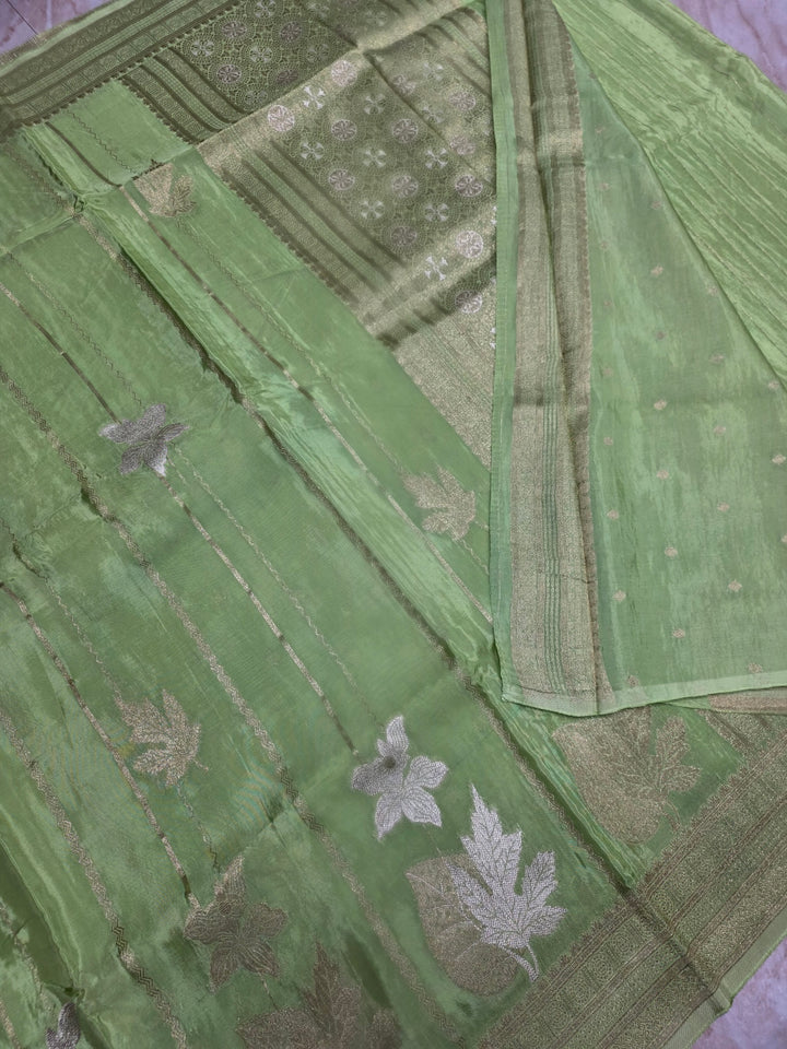 KOREAN SILK IN PISTA GREEN  WITH GOLD AND SILVER ZARI WORK