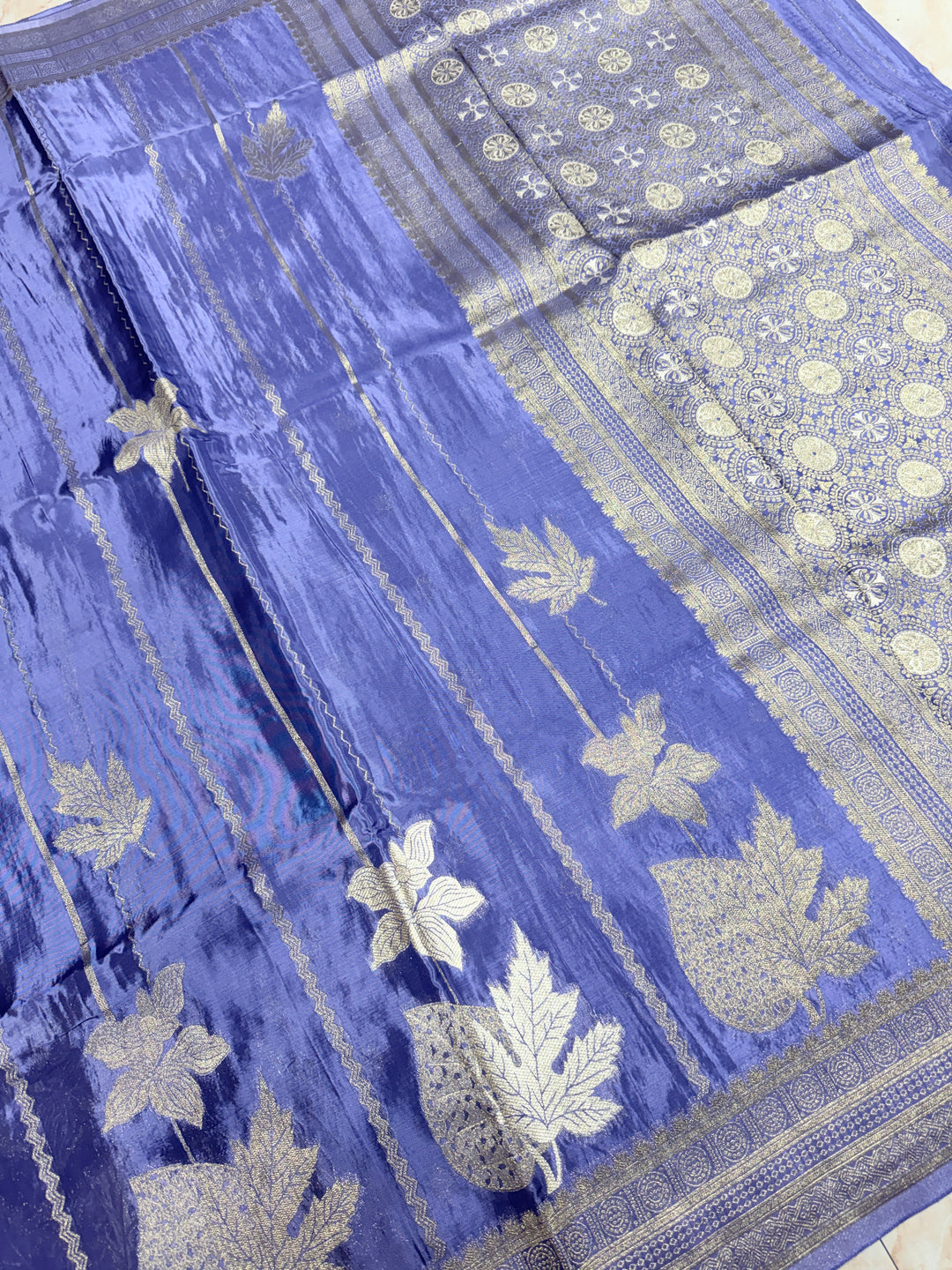 KOREAN SILK IN MATALLIC LIGHT LEVENDER WITH GOLD AND SILVER ZARI WORK