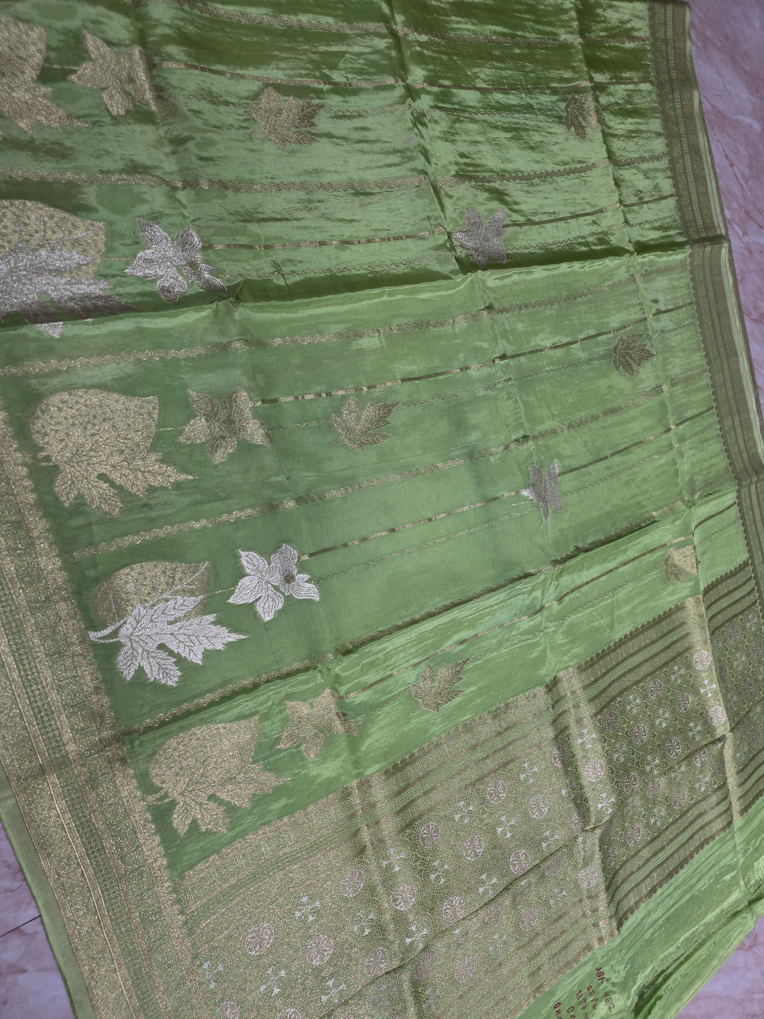 KOREAN SILK IN PISTA GREEN  WITH GOLD AND SILVER ZARI WORK