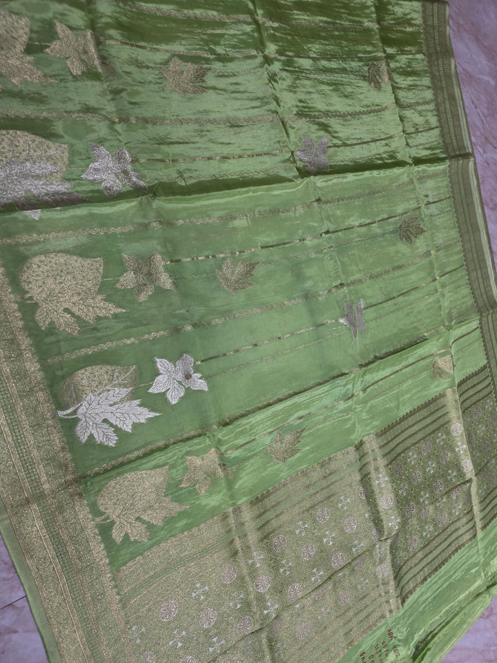 KOREAN SILK IN PISTA GREEN  WITH GOLD AND SILVER ZARI WORK