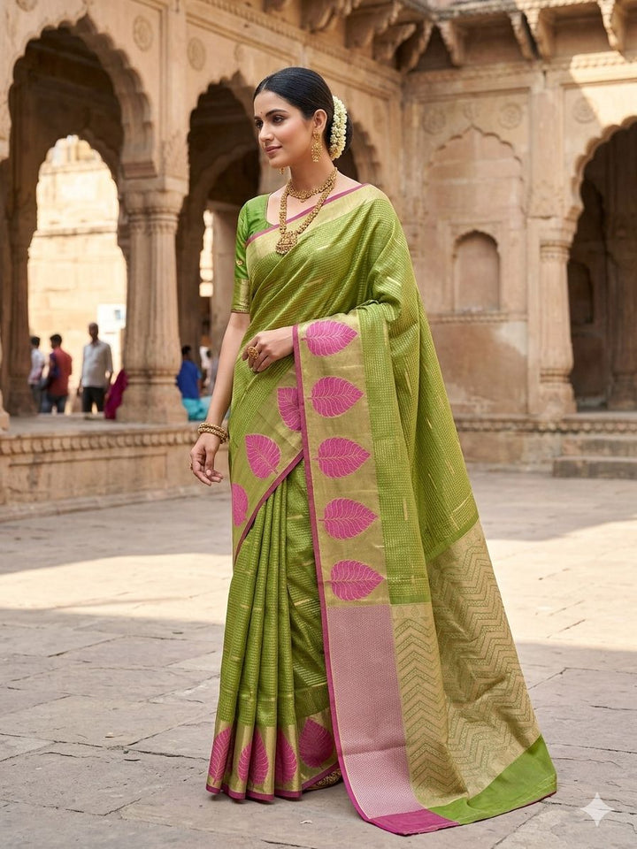 BANARASI SILK IN PARROT GREEN WITH TISU BORDER IN RANI COLOUR