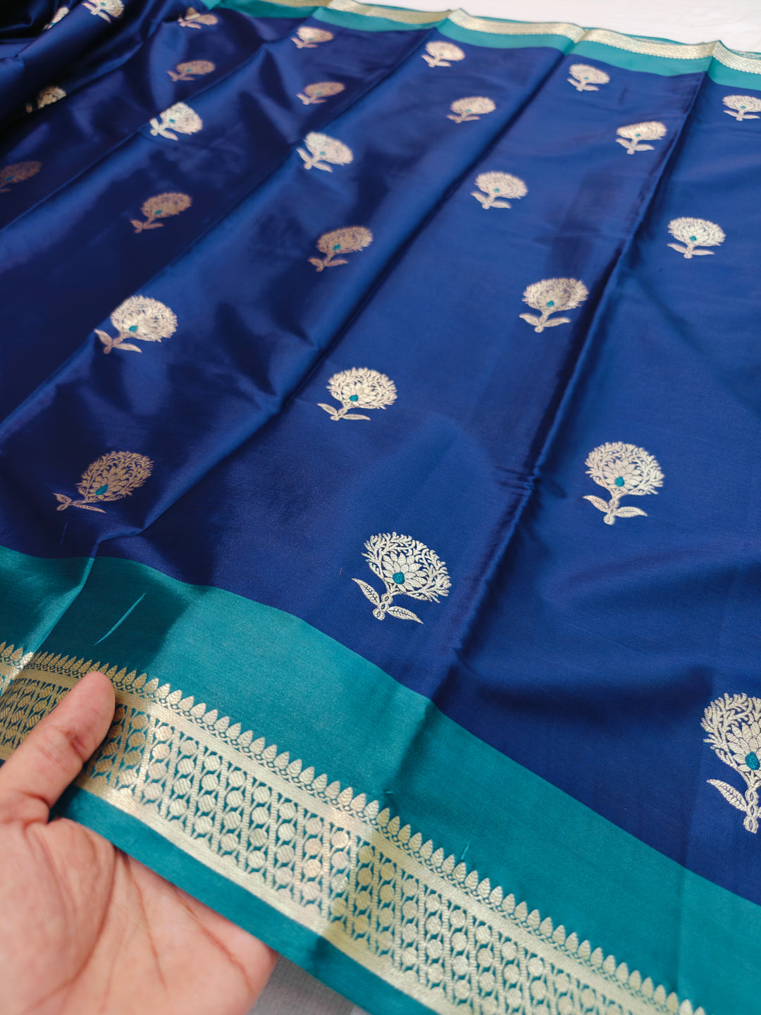NAVY BLUE BANARASI KATAN SILK  WITH SEA GREEN BORDER