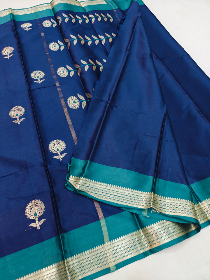 NAVY BLUE BANARASI KATAN SILK  WITH SEA GREEN BORDER