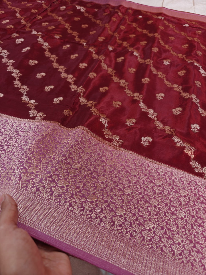 RUSSIAN SILK IN MAROON AND BABY PINK COLOUR BORDER WITH DIOGNAL FLORAL DESIGNS