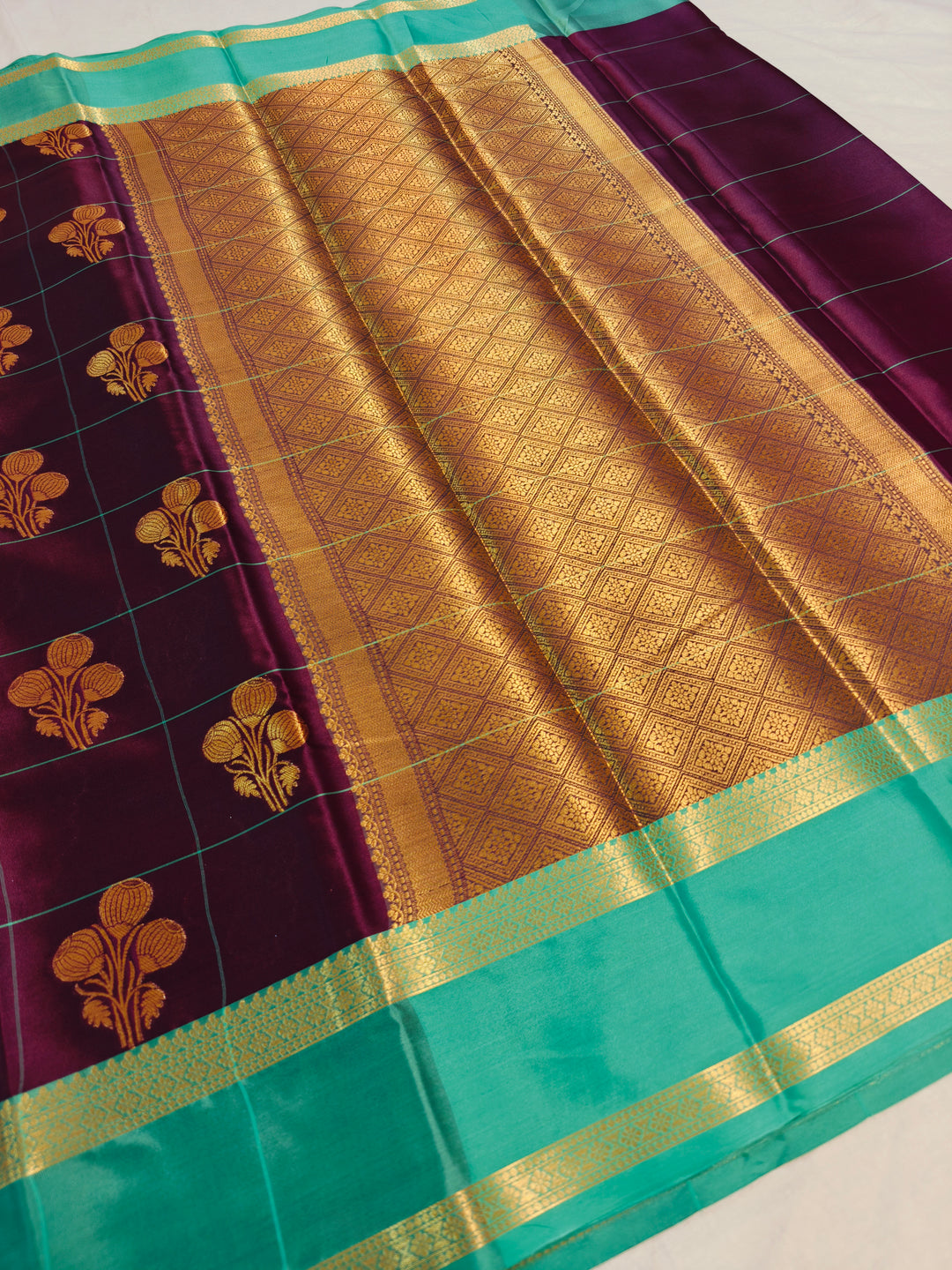 GARNET BANARASI SAREE WITH SEA GREEN BORDER INTRICATE CHECKS