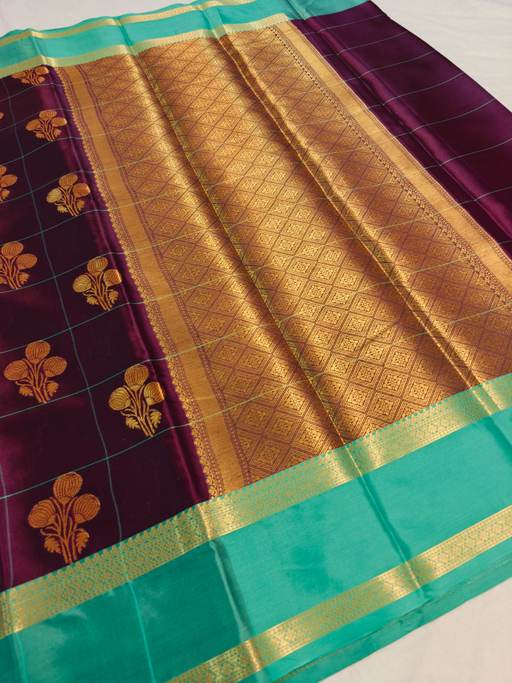 GARNET BANARASI SAREE WITH SEA GREEN BORDER INTRICATE CHECKS