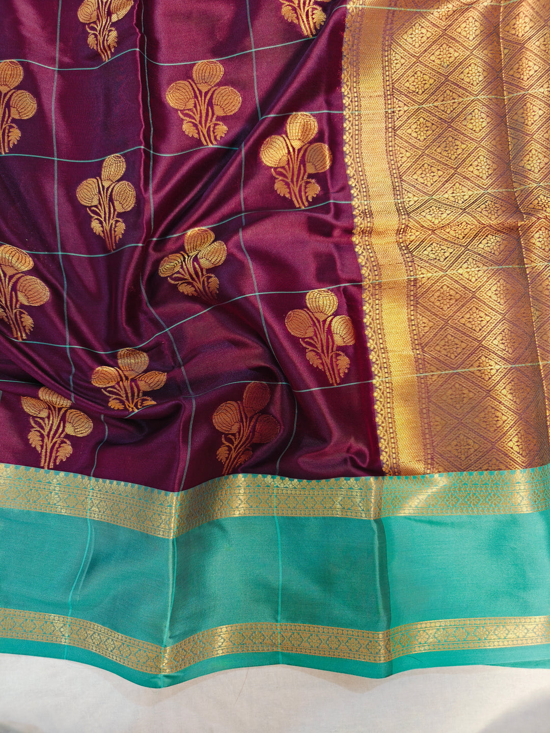 GARNET BANARASI SAREE WITH SEA GREEN BORDER INTRICATE CHECKS
