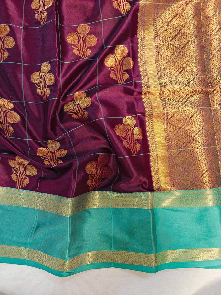 GARNET BANARASI SAREE WITH SEA GREEN BORDER INTRICATE CHECKS