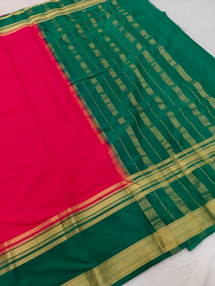 RED CREPE WITH DARK GREEN BORDER