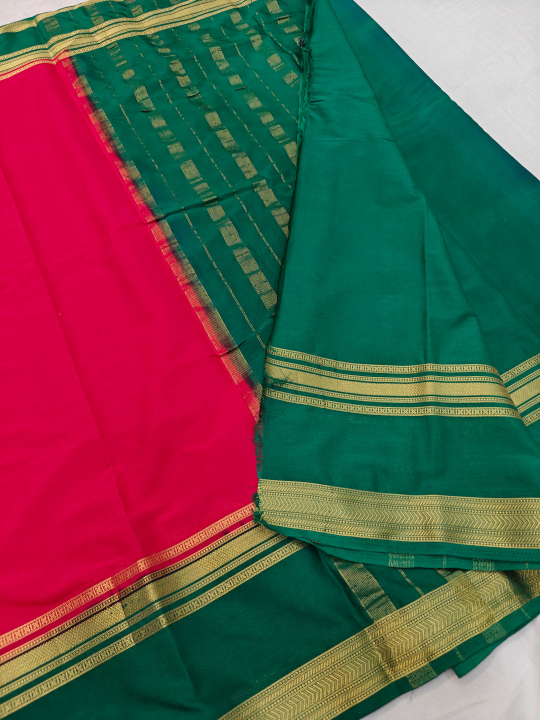 RED CREPE WITH DARK GREEN BORDER