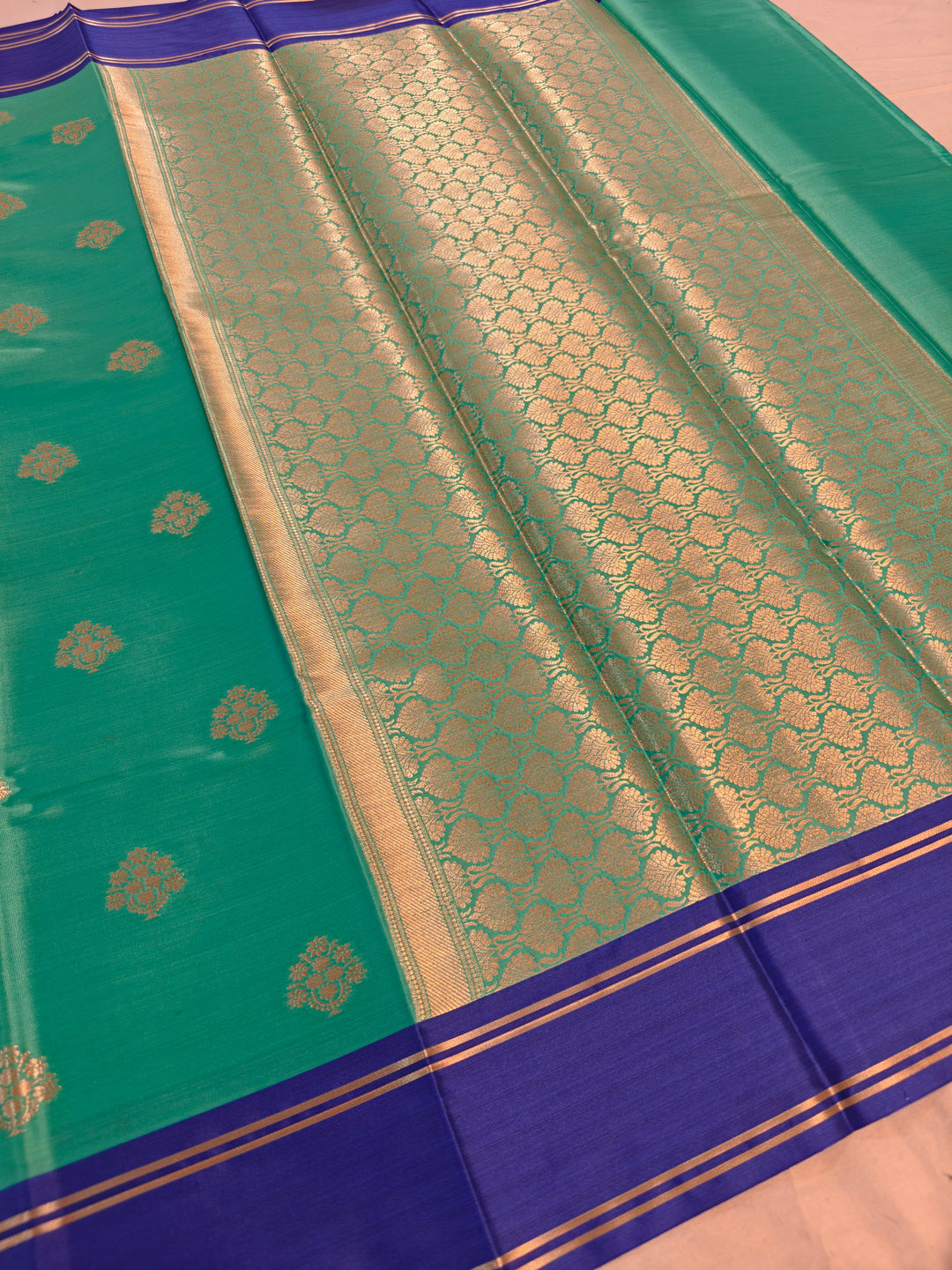 SEA GREEN BANARSI KATAN SILK WITH ROYAL BLUE BORDER