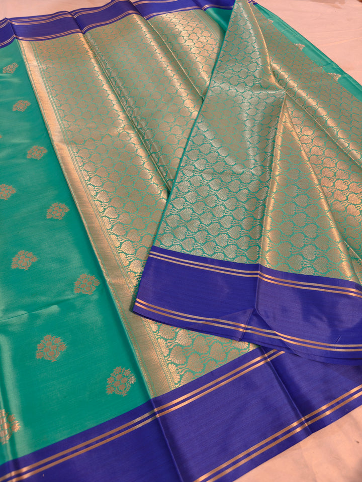 SEA GREEN BANARSI KATAN SILK WITH ROYAL BLUE BORDER