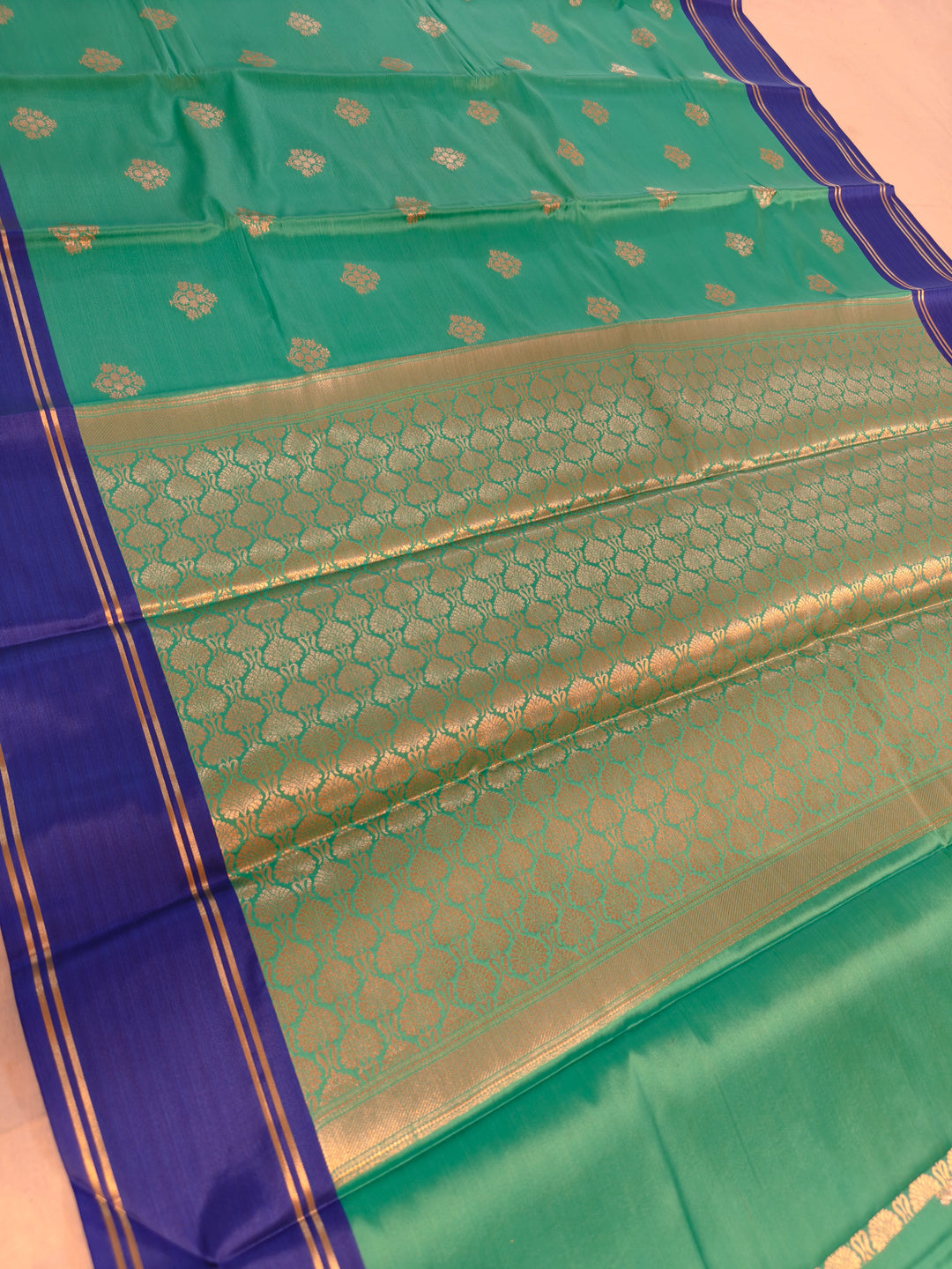 SEA GREEN BANARSI KATAN SILK WITH ROYAL BLUE BORDER