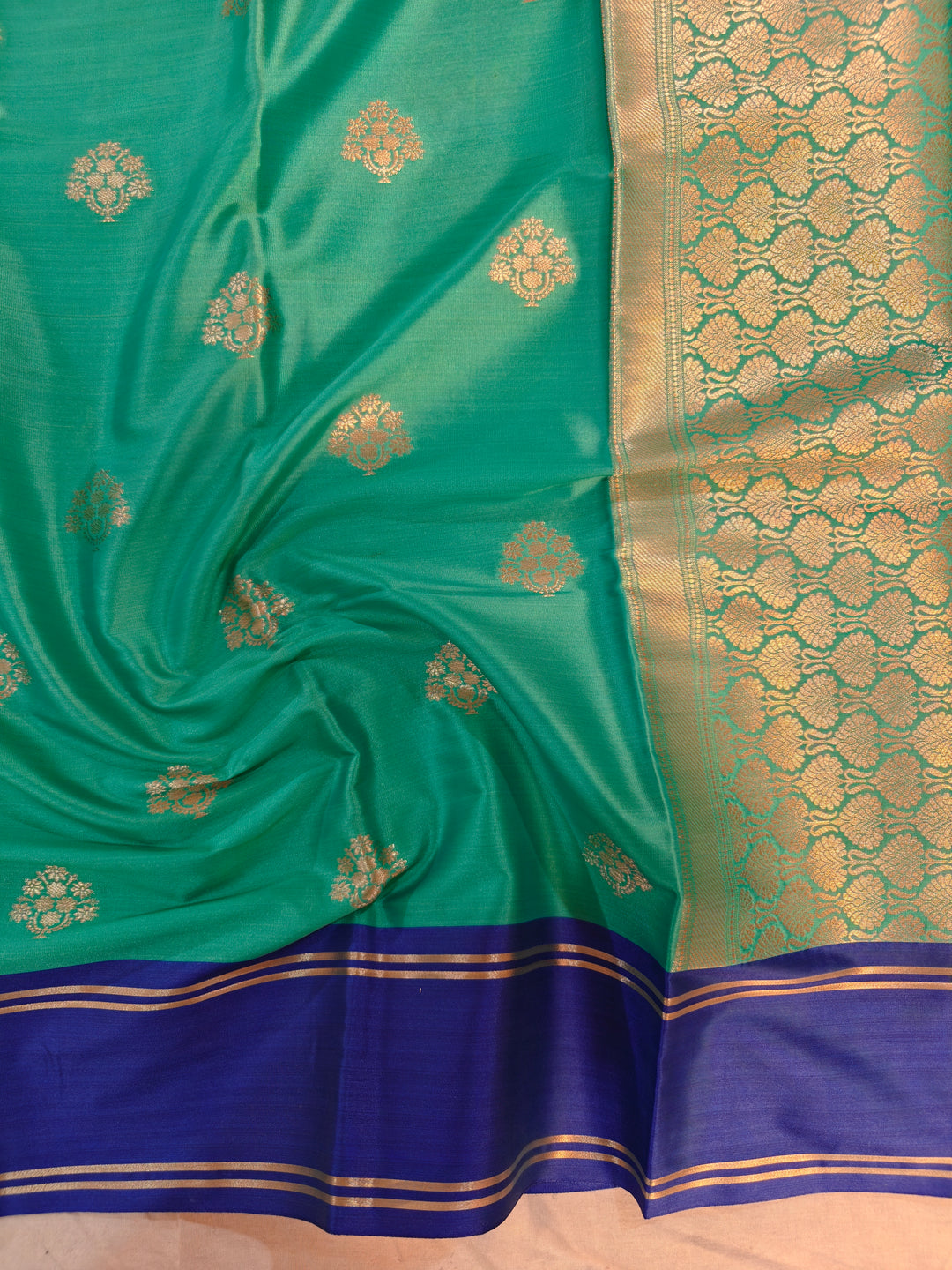 SEA GREEN BANARSI KATAN SILK WITH ROYAL BLUE BORDER