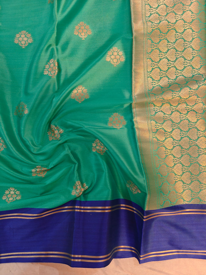 SEA GREEN BANARSI KATAN SILK WITH ROYAL BLUE BORDER