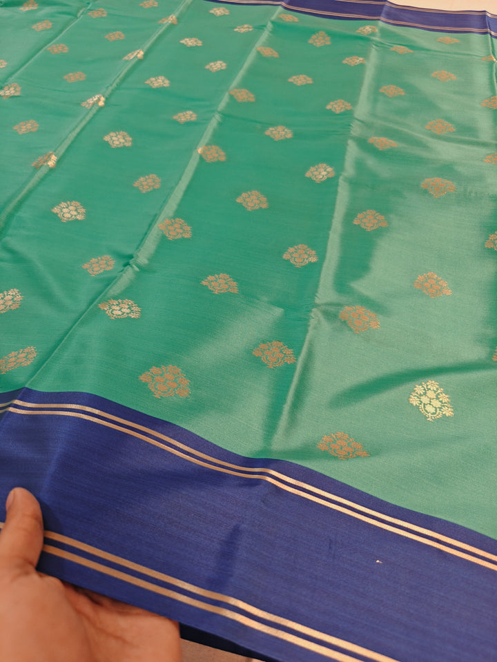 SEA GREEN BANARSI KATAN SILK WITH ROYAL BLUE BORDER