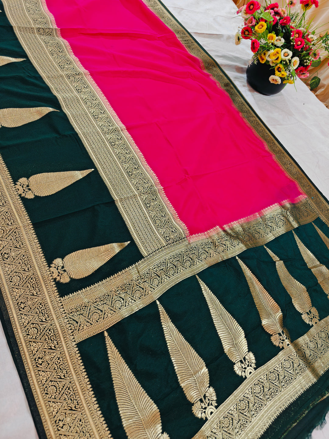 VIBRANT PINK KHADDI GEORGETTE WITH KAIRI BOOTA ON BLACK BORDER
