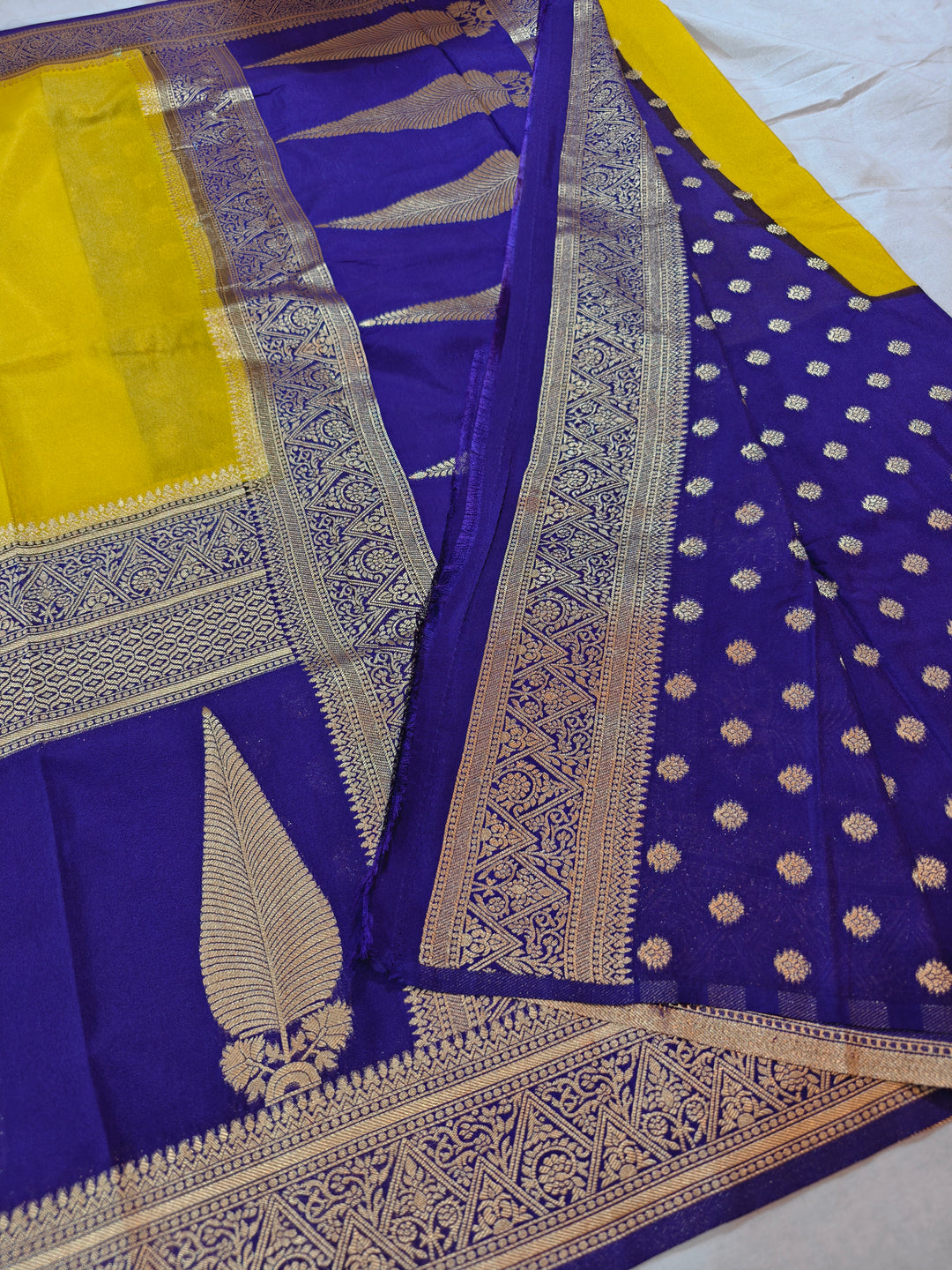 GOLD KHADDI GEORGETTE WITH KAIRI BOOTA ON MAGENTA BORDER