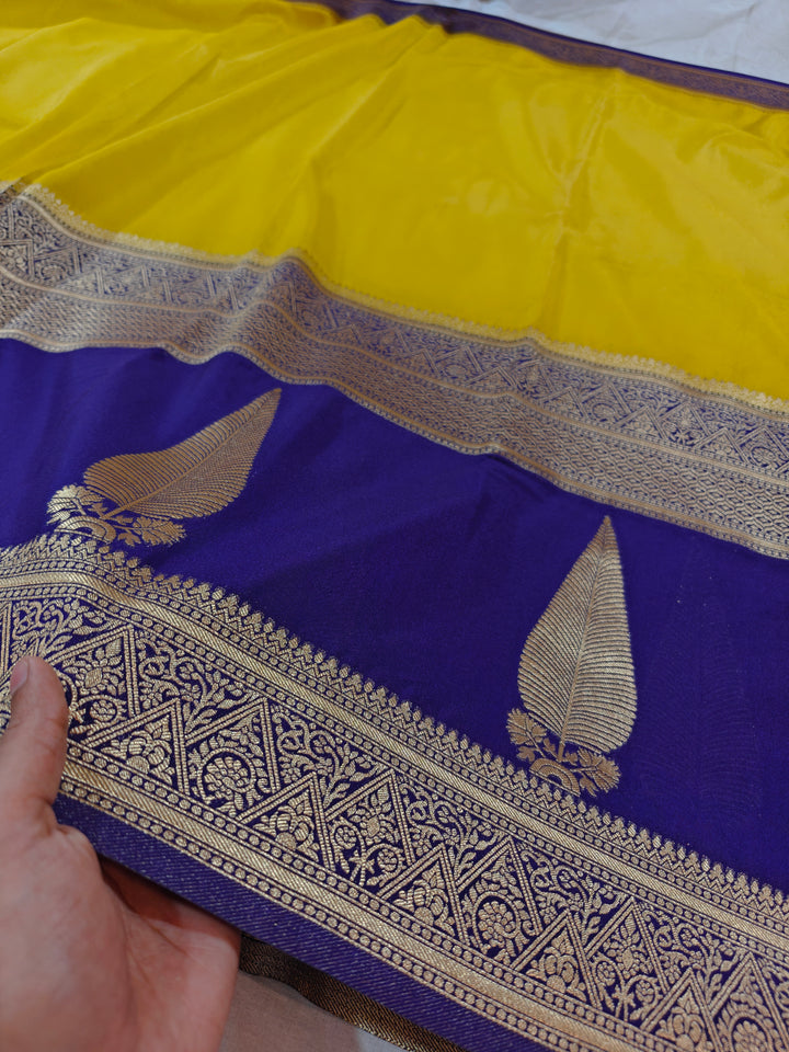 GOLD KHADDI GEORGETTE WITH KAIRI BOOTA ON MAGENTA BORDER