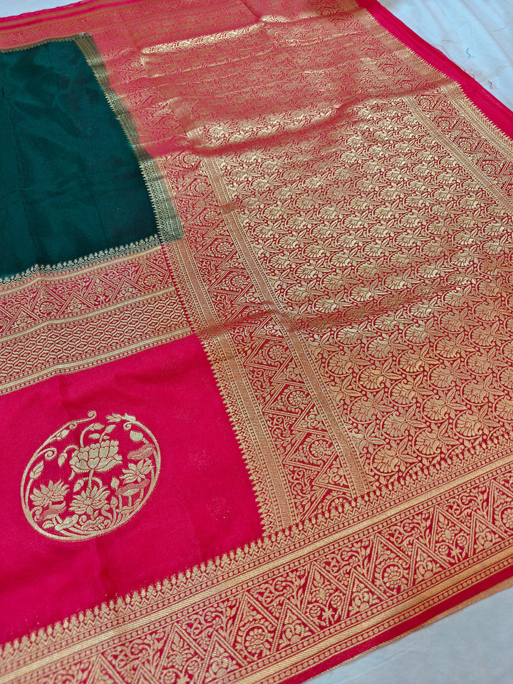 BOTTLE GREEN KHADDI GEORGETTE WITH RED BORDER