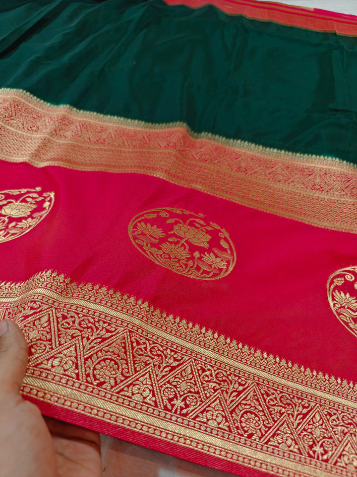 BOTTLE GREEN KHADDI GEORGETTE WITH RED BORDER