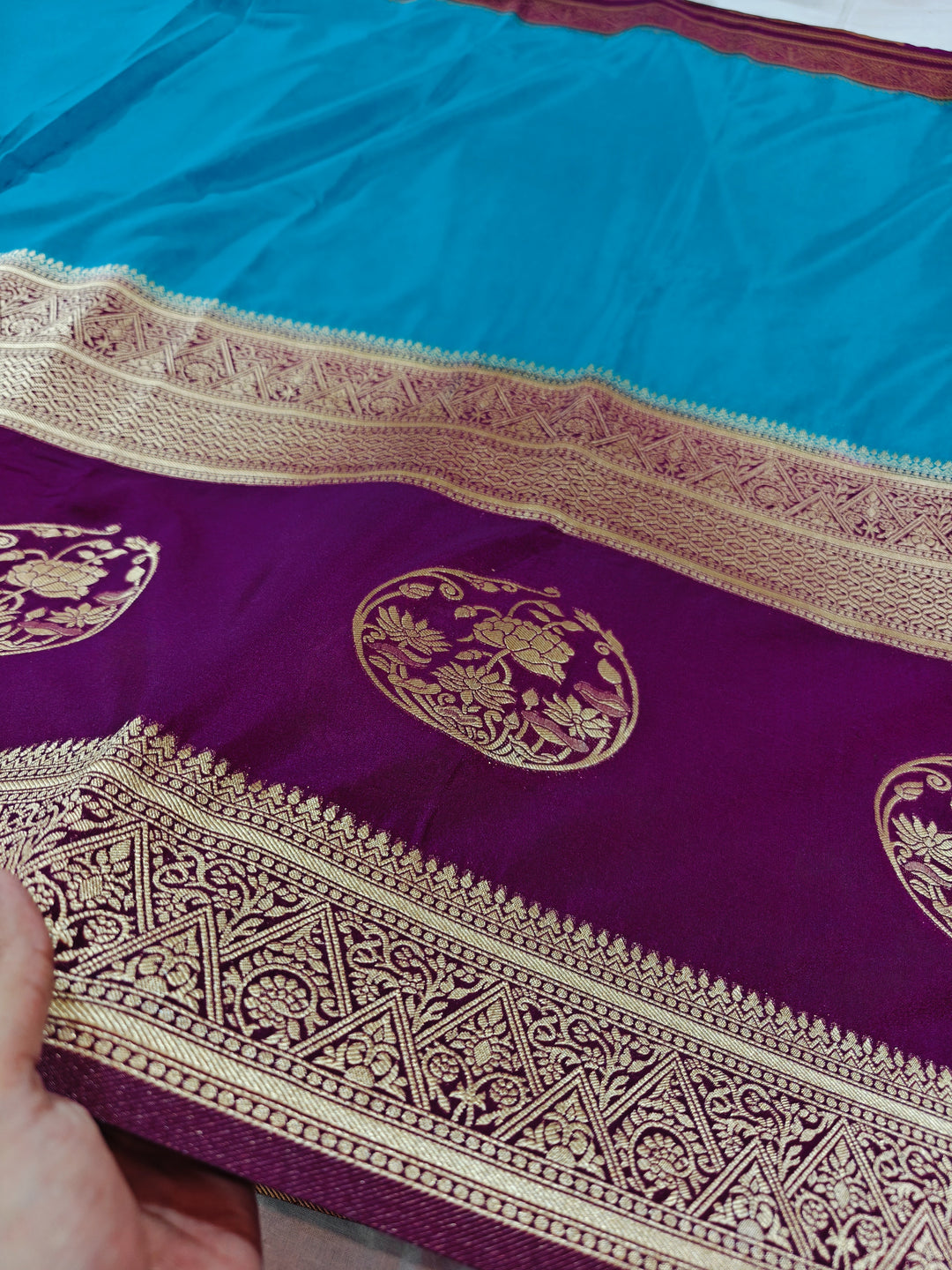 SKY BLUE KHADDI GEORGETTE WITH VINE BORDER