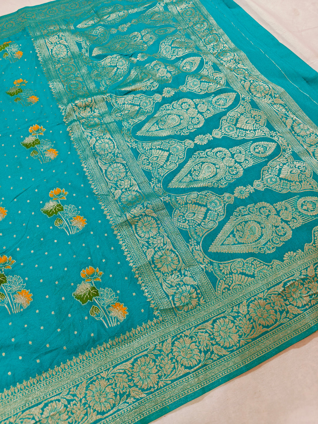 KHADDI GEORGETTE IN TEAL GREEN WITH PANCHRANG BOOTA