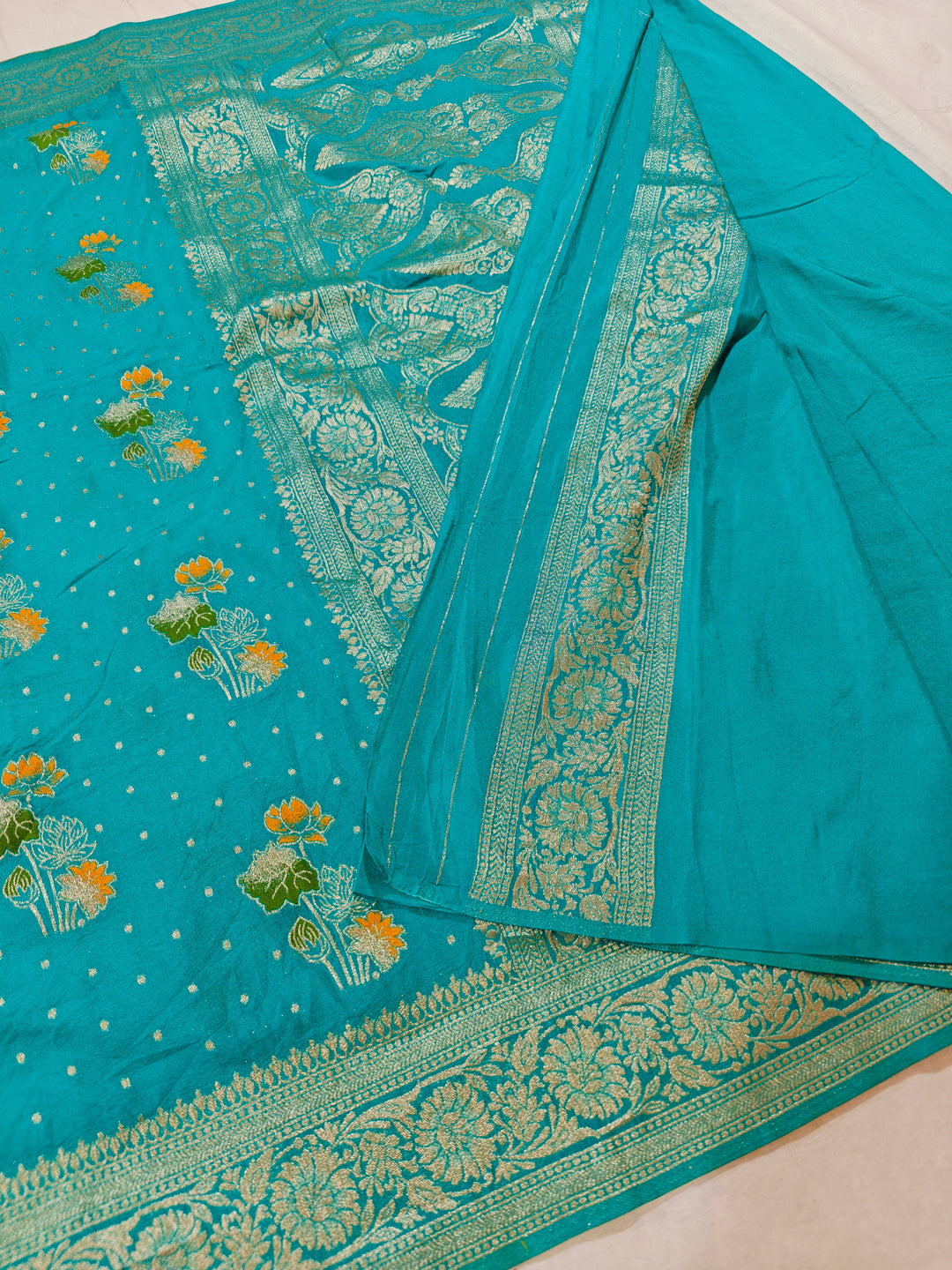 KHADDI GEORGETTE IN TEAL GREEN WITH PANCHRANG BOOTA