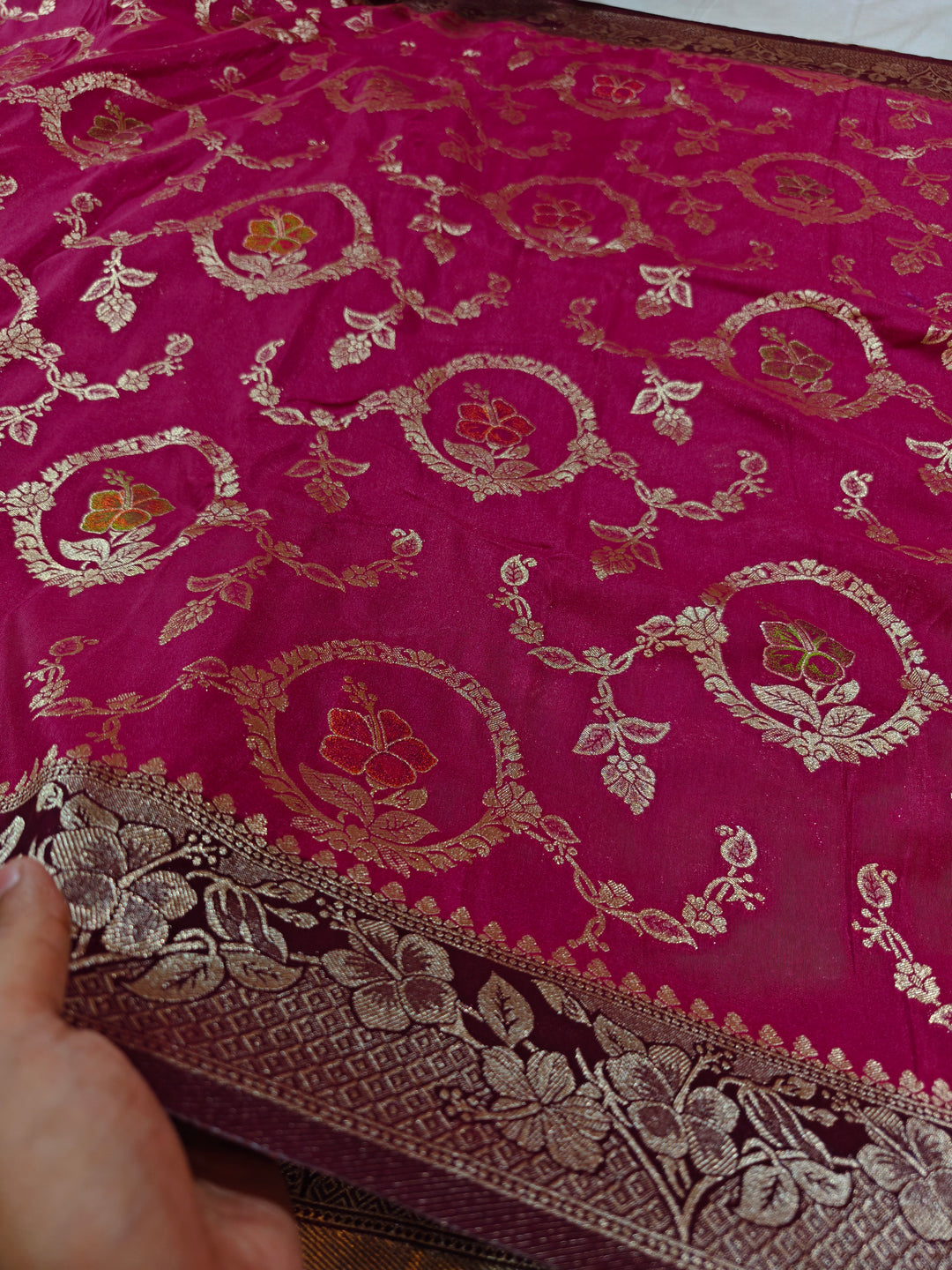 KHADDI GEORGETTE IN ONION COLOUR WITH  GARNET  BORDER