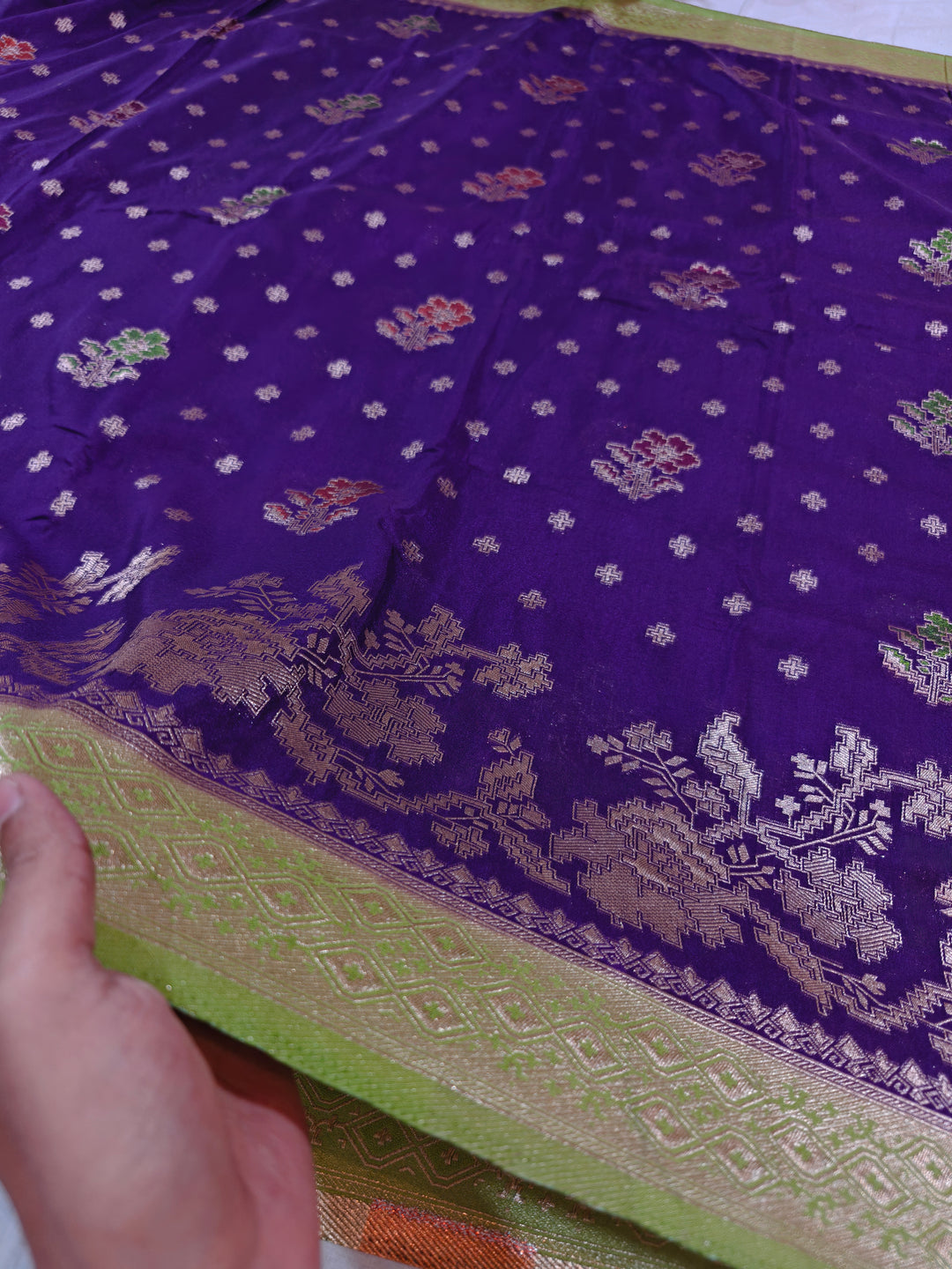 KHADDI GEORGETTE INDIGO COLOUR WITH PARROT GREEN BORDER