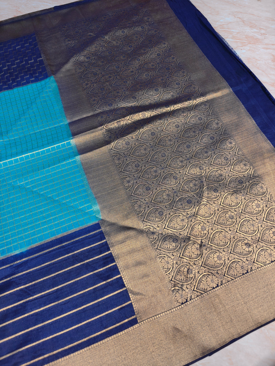 KHADDI GEORGETTE IN BLUE WITH NAVY BLUE BORDER
