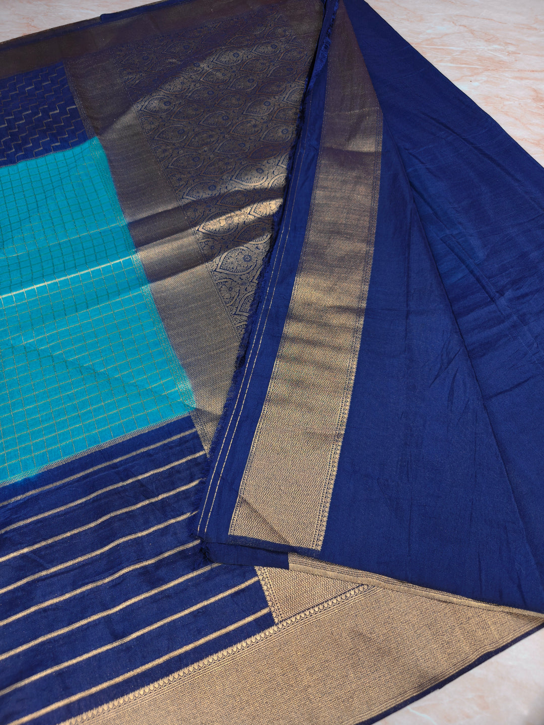 KHADDI GEORGETTE IN BLUE WITH NAVY BLUE BORDER