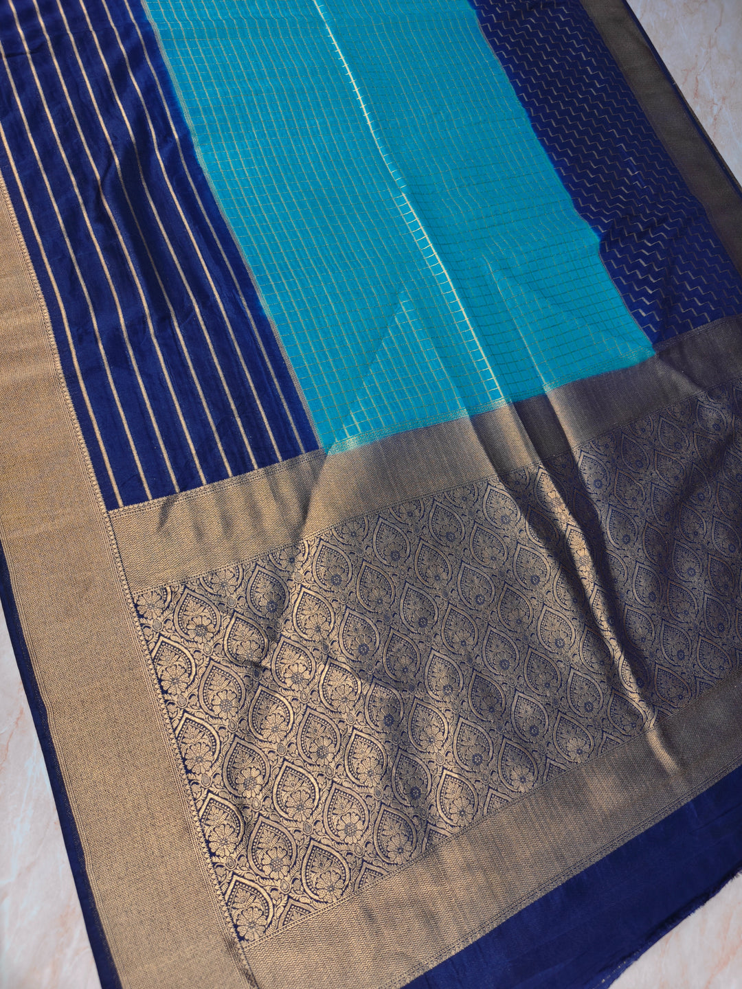KHADDI GEORGETTE IN BLUE WITH NAVY BLUE BORDER