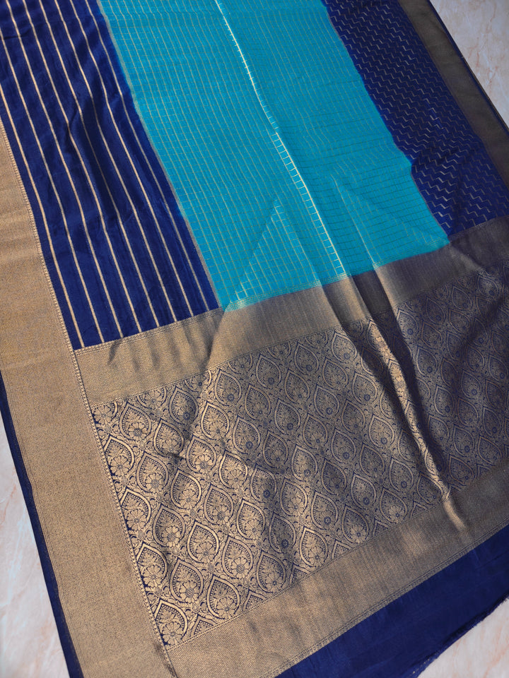 KHADDI GEORGETTE IN BLUE WITH NAVY BLUE BORDER