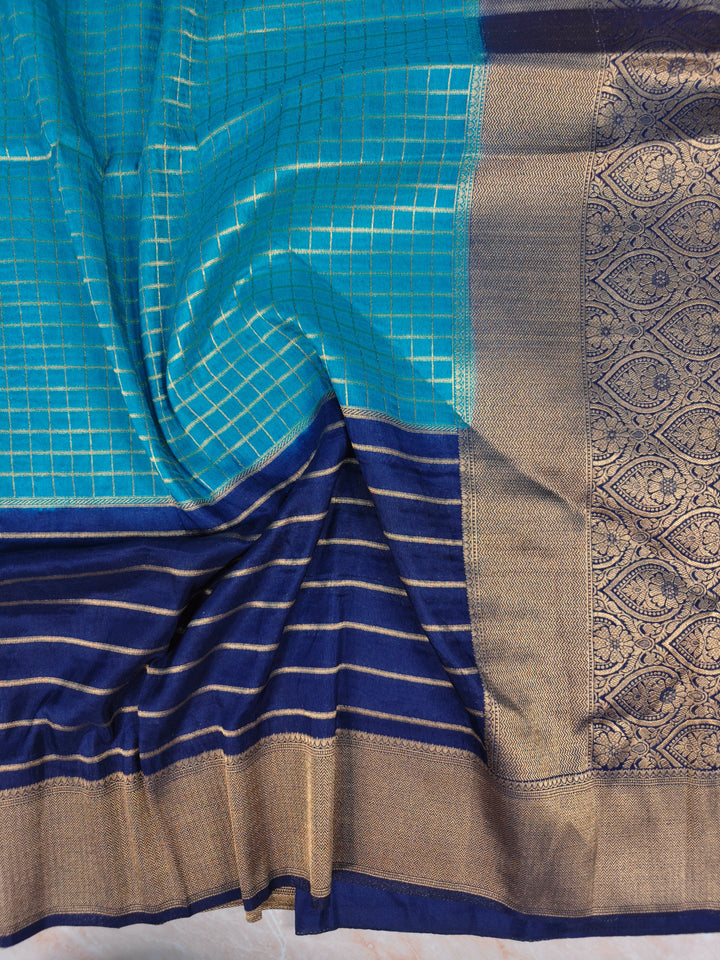 KHADDI GEORGETTE IN BLUE WITH NAVY BLUE BORDER