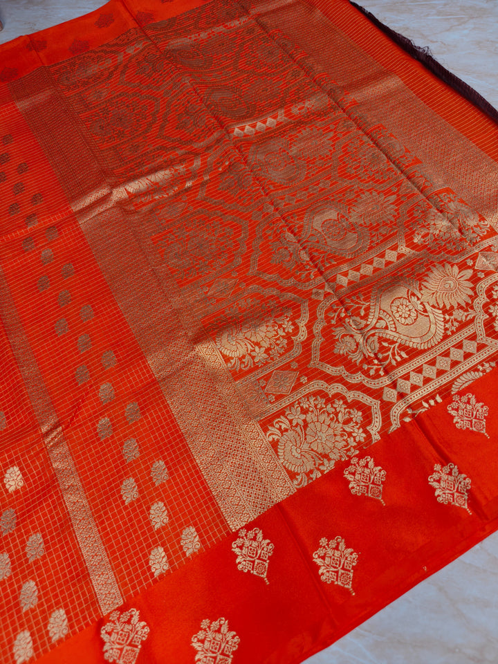 CREPE GEORGETTE IN TANGY ORANGE WITH CHECKS WORK