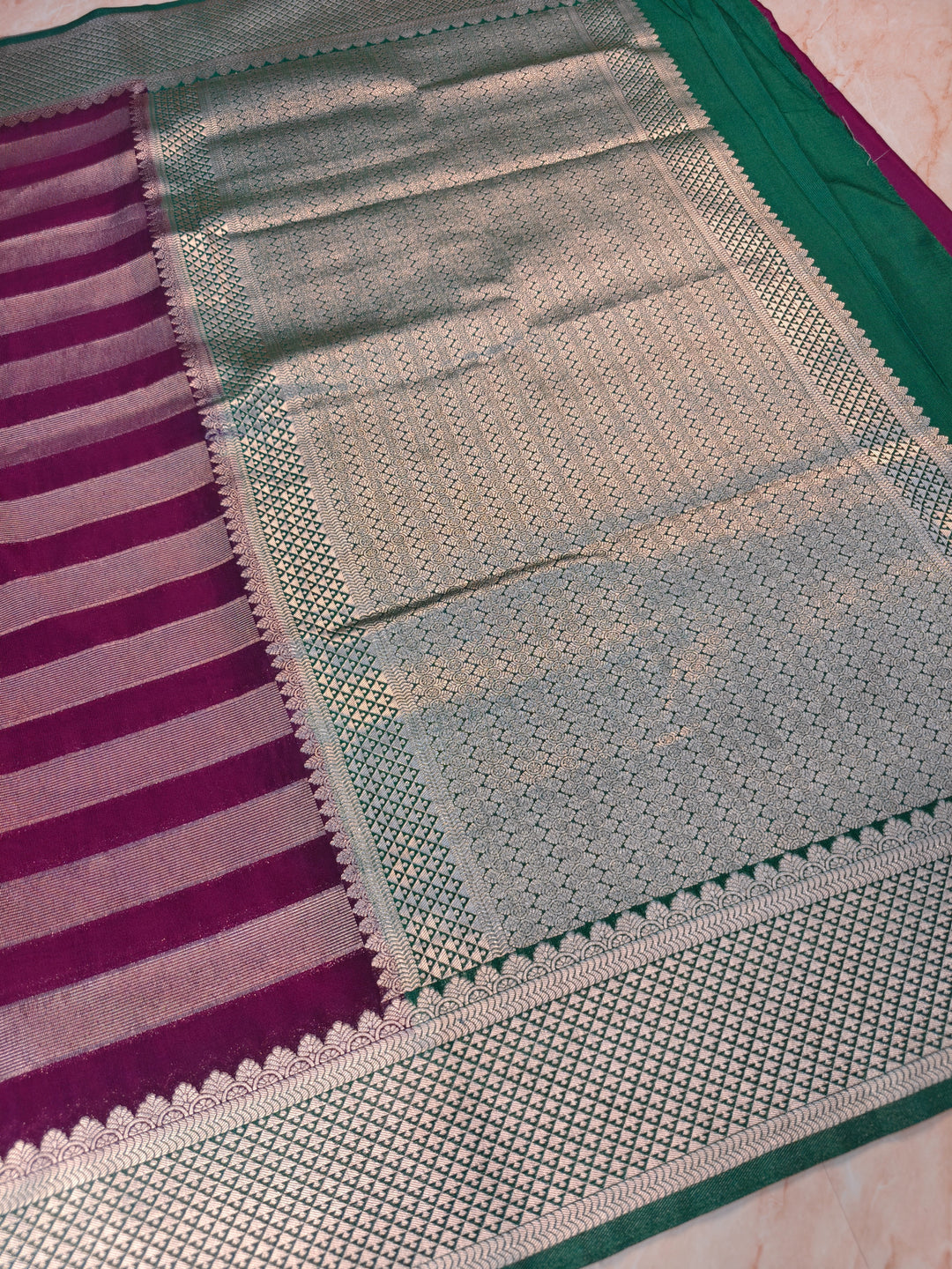 CREPE GEROGETTE IN MAGETA AND SILVER ZARI WORK WITH BOTTLE GREEN BORDER