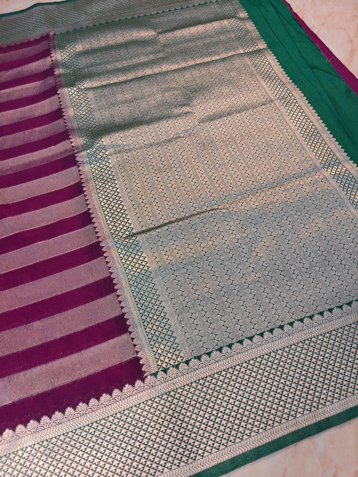 CREPE GEROGETTE IN MAGETA AND SILVER ZARI WORK WITH BOTTLE GREEN BORDER