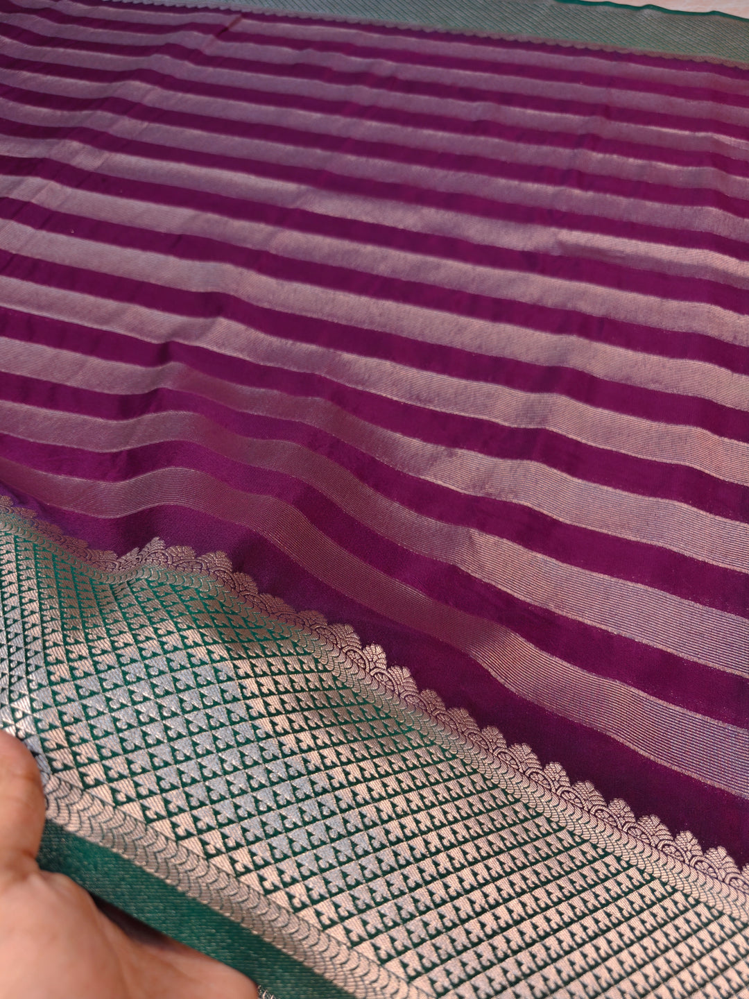 CREPE GEROGETTE IN MAGETA AND SILVER ZARI WORK WITH BOTTLE GREEN BORDER