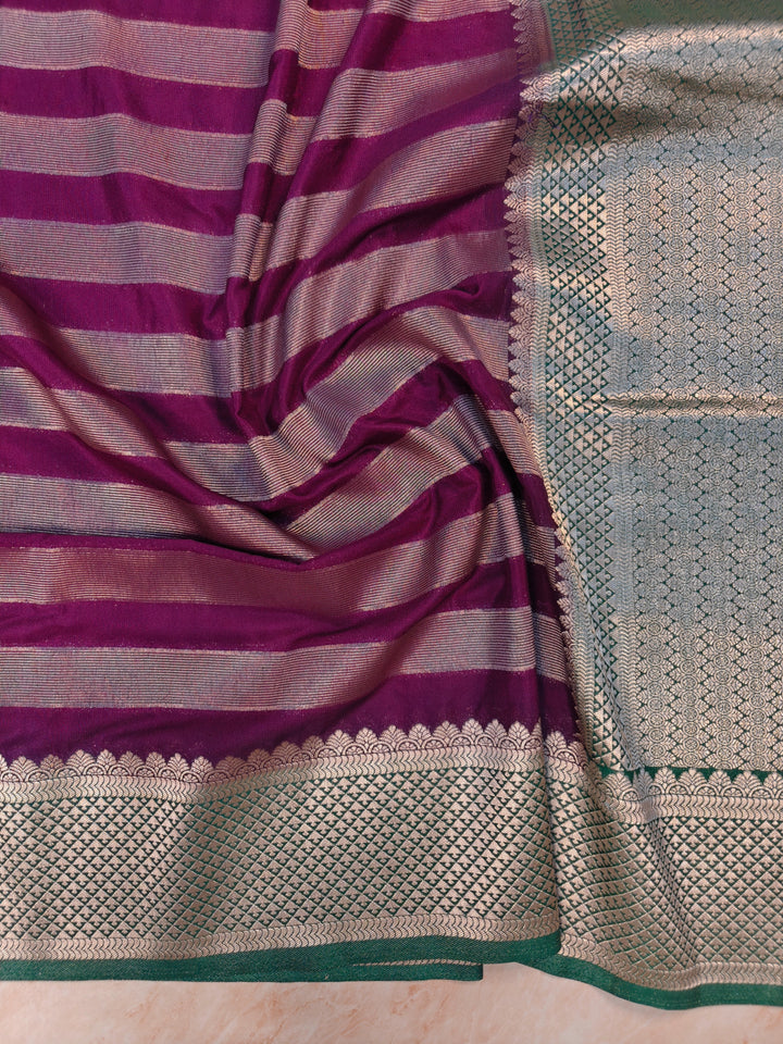 CREPE GEROGETTE IN MAGETA AND SILVER ZARI WORK WITH BOTTLE GREEN BORDER