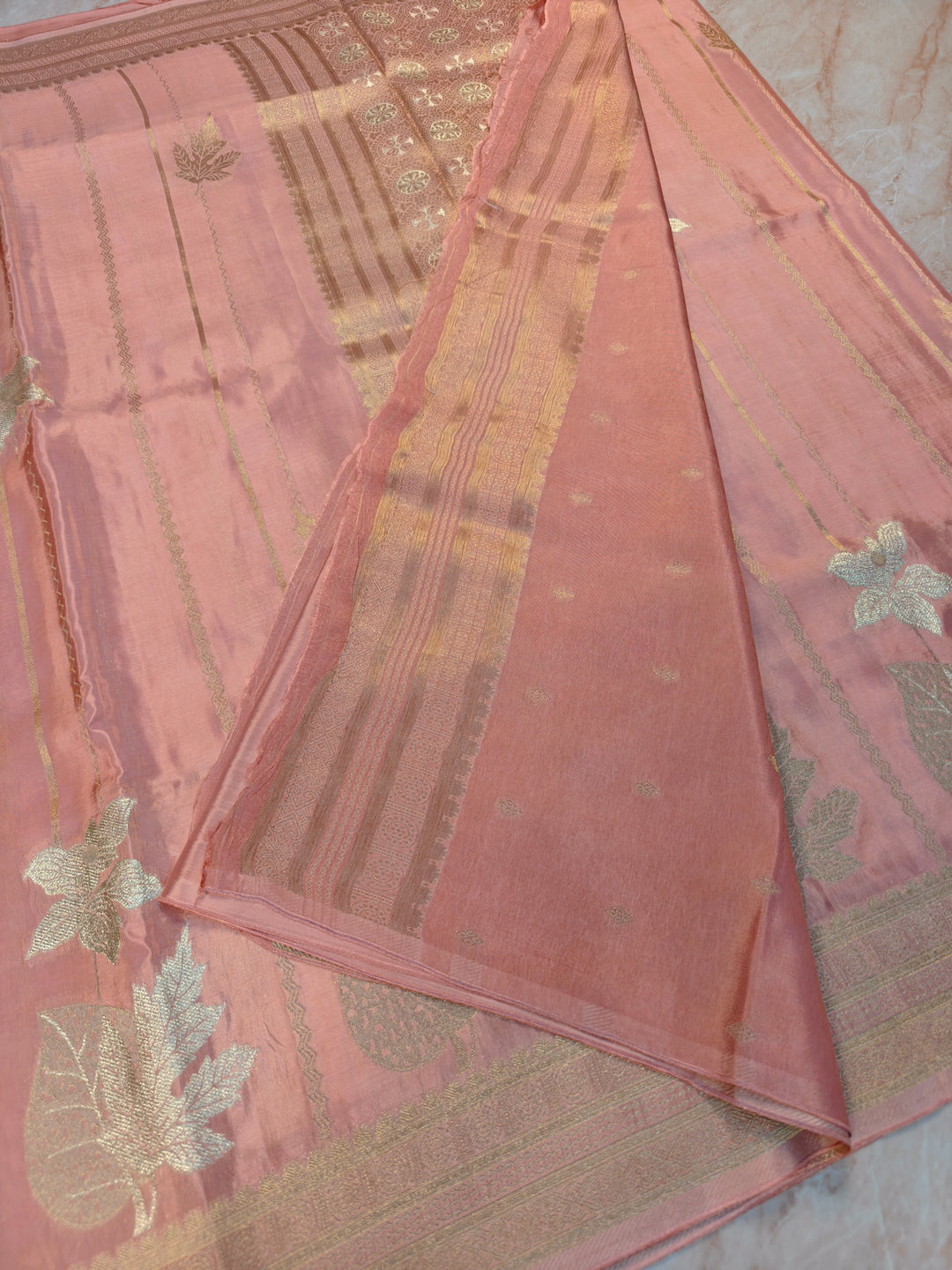 KOREAN SILK IN PEACH WITH GOLD AND SILVER ZARI WORK