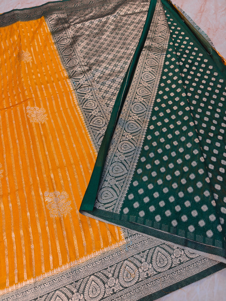 KHADDI GEORGETTE IN MUSTARD GOLD WITH BOTTLE GREEN BORDER