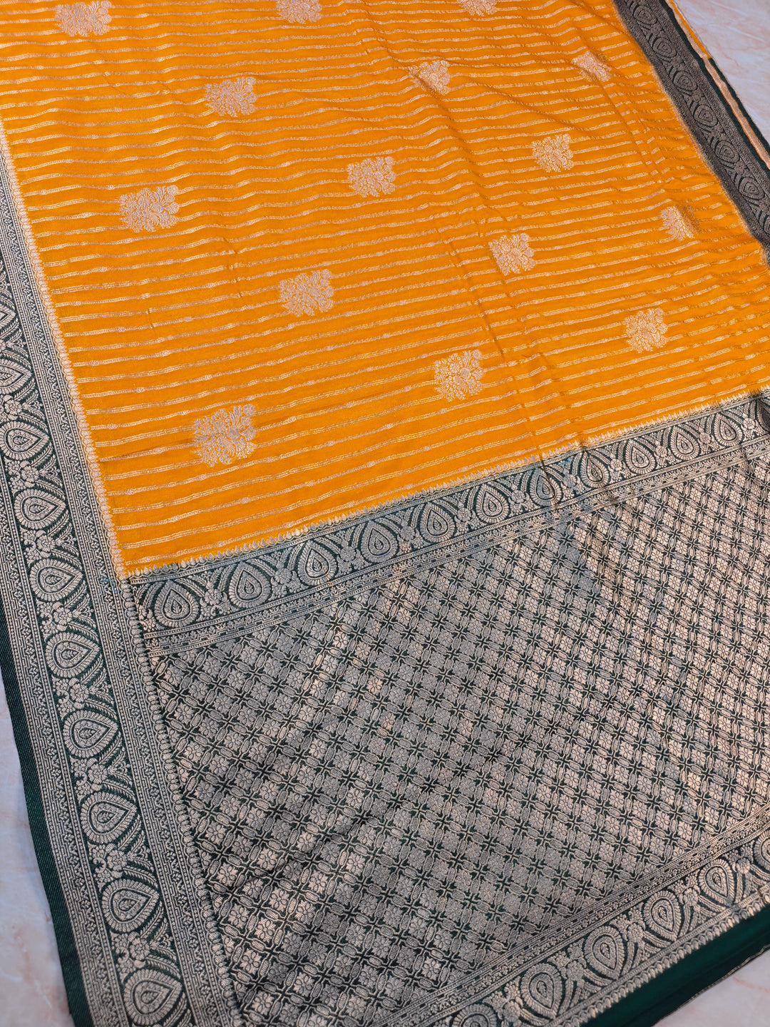 KHADDI GEORGETTE IN MUSTARD GOLD WITH BOTTLE GREEN BORDER