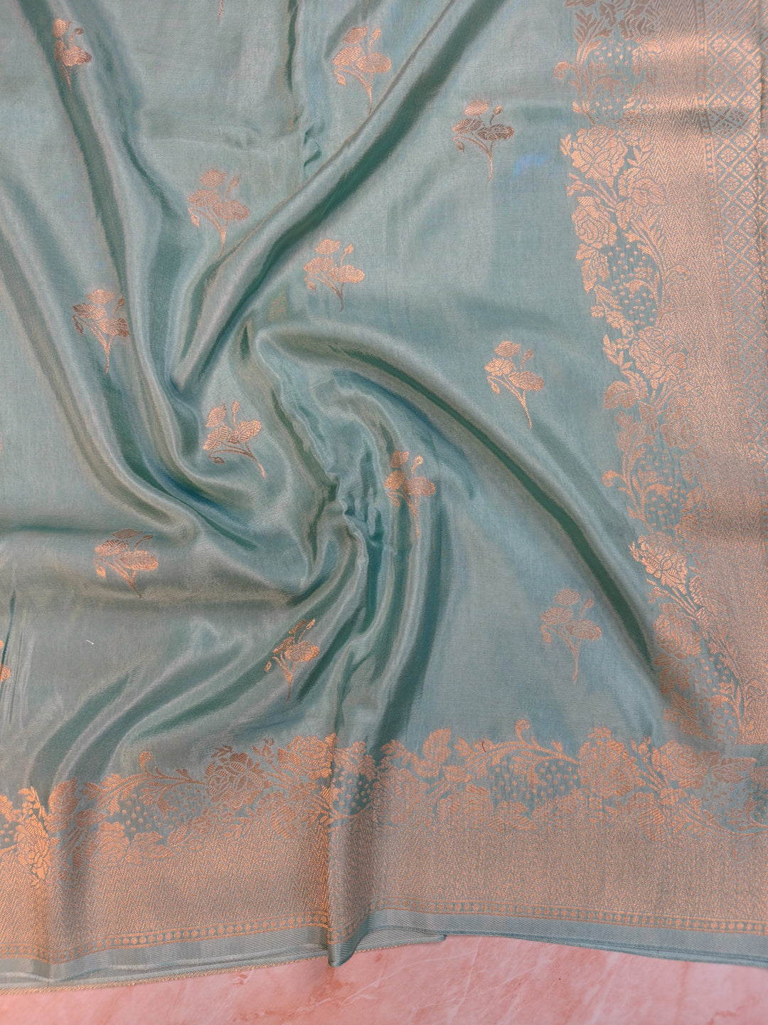 RUSSIAN SILK IN SEA GREENWITH FLORAL BOOTI SAREE