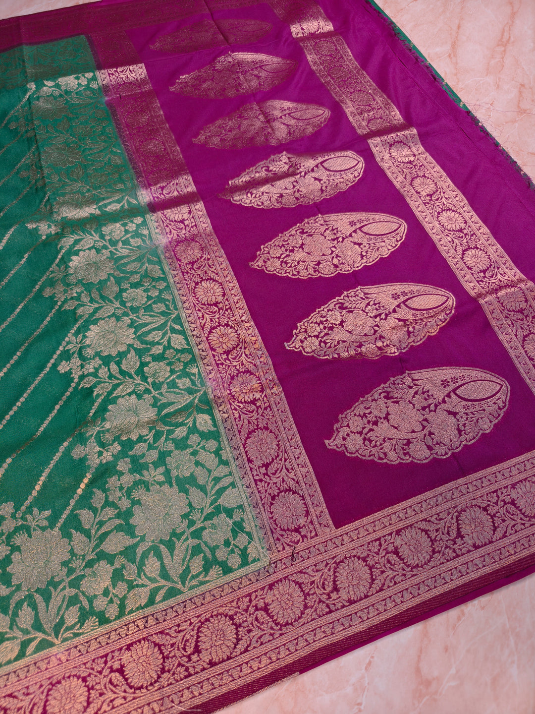 KHADDI GEORGETTE IN BOTTLE GREEN WITH MAGENTA BORDER