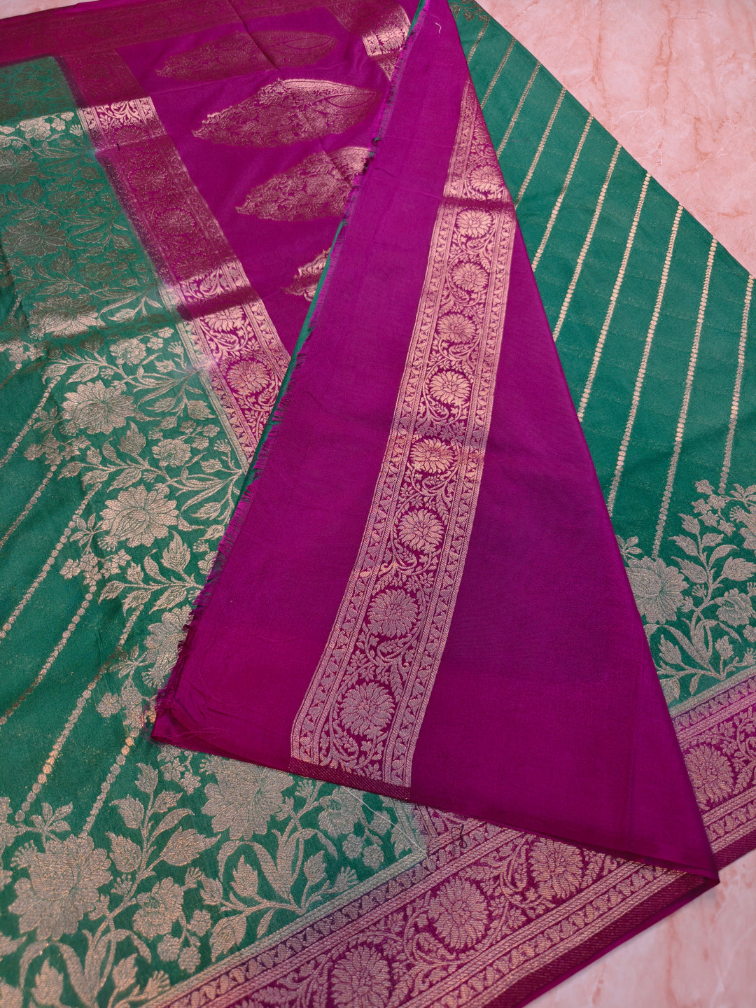 KHADDI GEORGETTE IN BOTTLE GREEN WITH MAGENTA BORDER