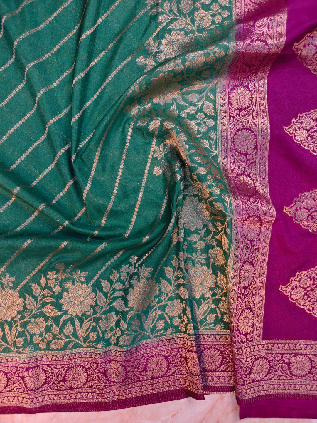 KHADDI GEORGETTE IN BOTTLE GREEN WITH MAGENTA BORDER
