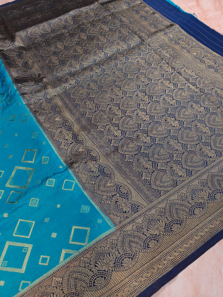RUSSIAN SILK IN TURQUOISE BLUE WITH NAVY BLUE BORDER