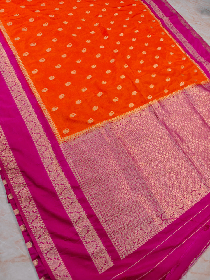 KHADDI GEORGETTE IN ORANGE WITH RANI BORDER